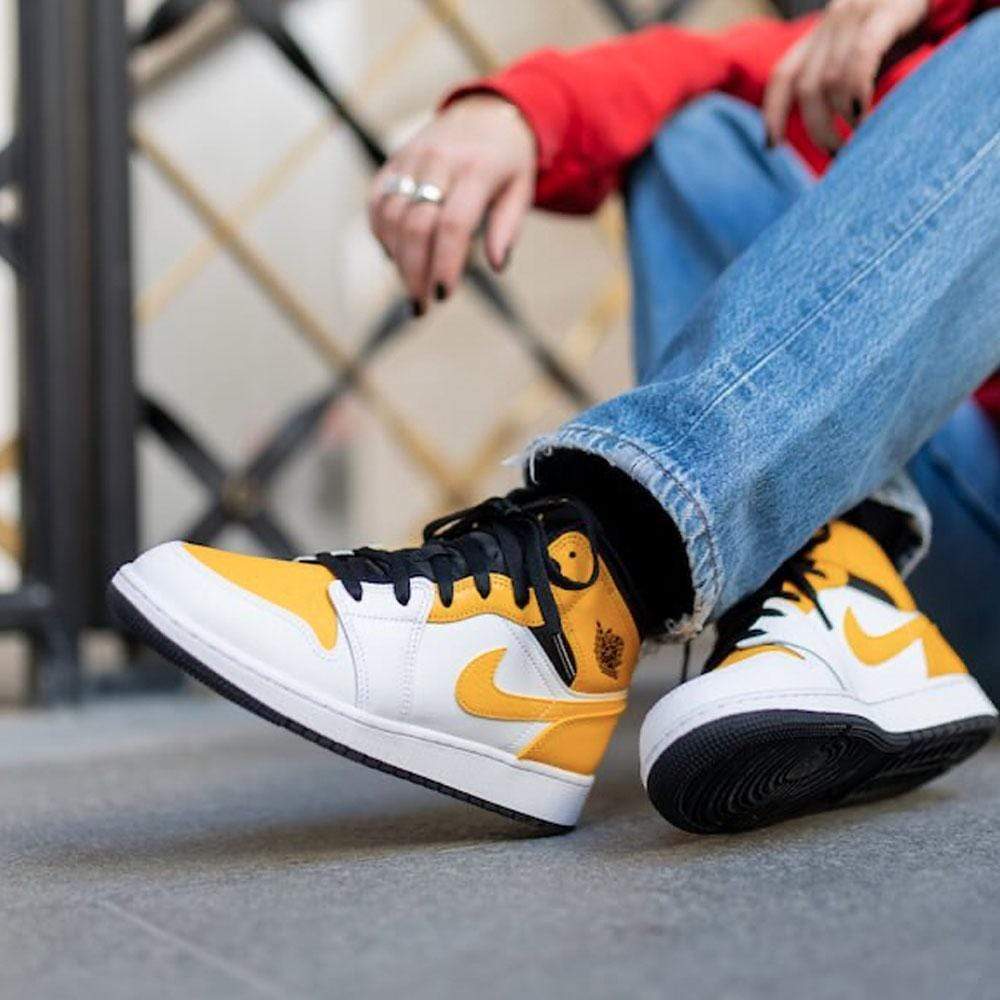 Air Jordan 1 Mid GS 'University Gold'- Streetwear Fashion - helmiss.com