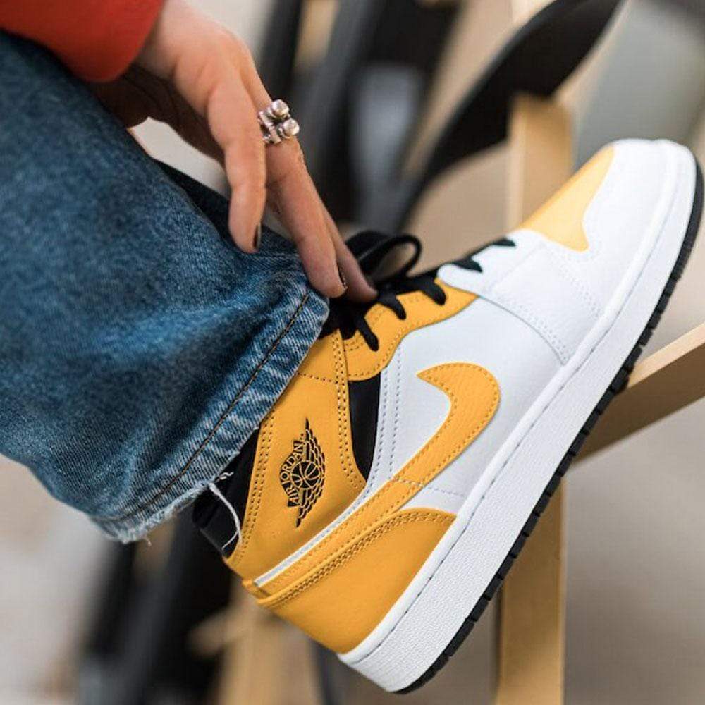 Air Jordan 1 Mid GS 'University Gold'- Streetwear Fashion - helmiss.com