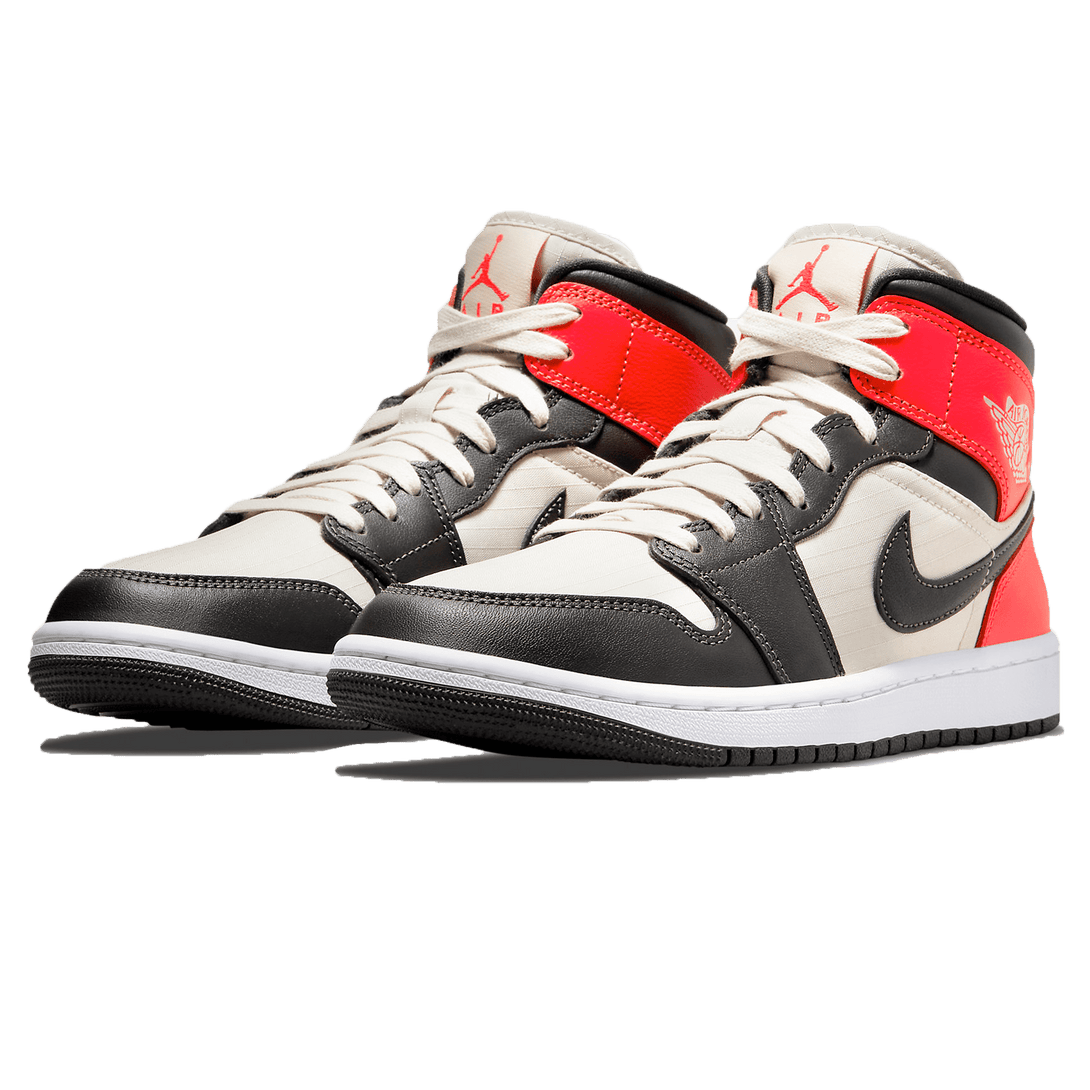 Air Jordan 1 Mid SE Wmns 'Newsprint'- Streetwear Fashion - helmiss.com