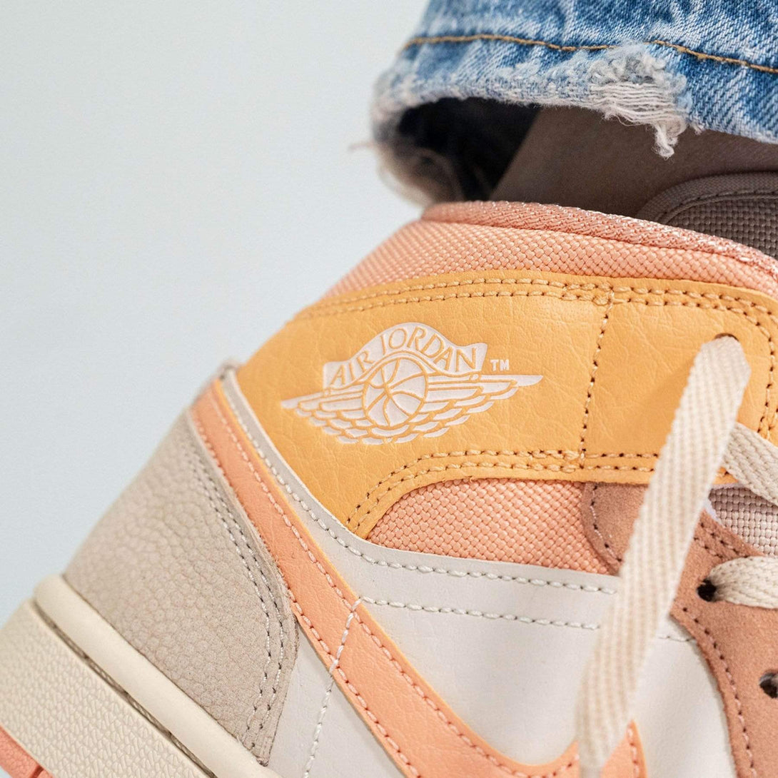 Air Jordan 1 Wmns Mid 'Apricot'- Streetwear Fashion - helmiss.com